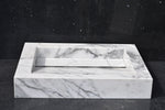 Custom white marble farmhouse sink