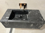 black fluted marble sink, a luxurious and modern choice for those seeking unique bathroom sink ideas.